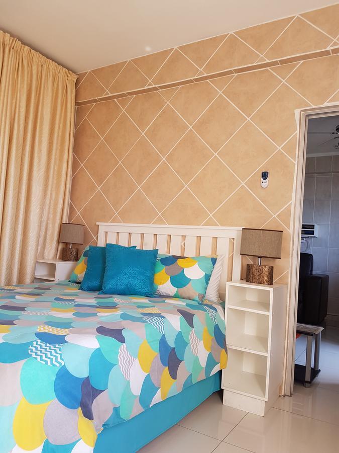 Beach Frond Apartment امانزيمتوتي المظهر الخارجي الصورة